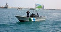 Djiboutian Coast Guards patrol in the port harbor