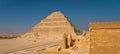 Djoser Step Pyramid the first pyramid built in Egypt, Saqqara, Lower Egypt. Panoramic banner portion Royalty Free Stock Photo