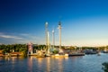 Djurgarden island and Tivoli carousel attractions, Stockholm, Sw Royalty Free Stock Photo