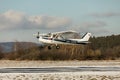 DLOUHA LHOTA CZECH REP - JAN 27 2021. Cessna 150 small sports plane takes off at the airport in Dlouha Lhota