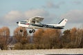 DLOUHA LHOTA CZECH REP - JAN 27 2021. Cessna 150 small sports plane takes off at the airport in Dlouha Lhota