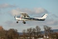 DLOUHA LHOTA  CZECH REP - JAN 27  2021. Cessna 150 small sports plane takes off at the airport in Dlouha Lhota Royalty Free Stock Photo