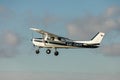 DLOUHA LHOTA  CZECH REP - JAN 27  2021. Cessna 150 small sports plane takes off at the airport in Dlouha Lhota Royalty Free Stock Photo