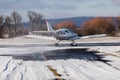 DLOUHA LHOTA  CZECH REP - JAN 27  2021. SportCruiser small sports plane. The small SportCruiser takes off on a snowy runway Royalty Free Stock Photo