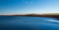 Dlouhe strane water reservoir with Praded, Petrovy kameny and Vysoka hole hill in Jeseniky mountains in Czech republic