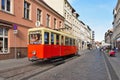 Dluga street in Bydgoszcz with old tram used as tourist information Royalty Free Stock Photo