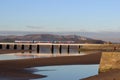 Dmu train with reflection on Arnside Viaduct