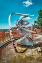 DNA Monument of Charles Jenks on the top of a spiral hill in Portello park