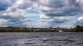 Dnepr River.City on the shore.Blue sky with scenic clouds.