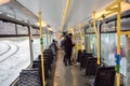 Dnepr, Ukraine - January 13, 2017: Passengers who travel on the tram and get ready to go to their stop