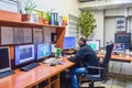 Dnepr, Ukraine - May 16, 2017: man works in the control room. A specialist oversees security systems. Monitoring the activity of