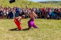 Two young cossacks fighting during the ethno-rock festival Kozak Fest