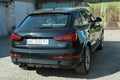 Dnepropetrovsk, Ukraine - 06.08.2022: AUDI Q3 in black. Subcompact luxury crossover Audi Q3. Rear view, side view
