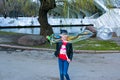 Cheerful cute children blowing soap bubbles in a park in nature. Joyful emotions in a child Royalty Free Stock Photo