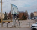 Installation of outdoor advertising in the city. Specialists climb the stairs to the billboard. Work at height