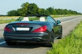 Photos of the Mercedes Benz SL550 convertible on the road Royalty Free Stock Photo