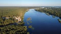 the Dnieper river flows among the forests and fields, ukraine filming from a drone. view from above Royalty Free Stock Photo