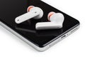 Dnipo, Ukraine, february 20, 2023: JBL Tune 230 NC TWS headphones. Closeup modern headphone on phone media portable