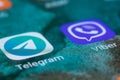 Dnipo, Ukraine, October 17, 2022: Telegram icon app and Viber messenger icon app on the screen smartphone closeup