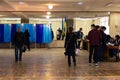 DNIPRO, UKRAINE - 2019 April, 21: Voters near voting booth at polling station during the second round of the election of President Royalty Free Stock Photo