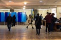 DNIPRO, UKRAINE - 2019 April, 21: Voters near voting booth at polling station during the second round of the election of President