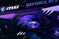 Dnipro, Ukraine - February 23, 2023: MSI Geforce RTX gaming graphics card in a open case with glow