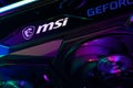 Dnipro, Ukraine - February 23, 2023: MSI Geforce RTX gaming graphics card in a open case with glow