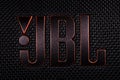 Dnipro, Ukraine - 15 january, 2022: JBL logo. Black bluetooth column JBL. Black bluetooth JBL column