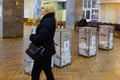 DNIPRO, UKRAINE - March 31, 2019:View of ballots in ballot box at vote station. Election of Ukraine President. Observers from Royalty Free Stock Photo