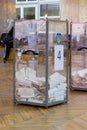 View of ballots in ballot box at vote station. Election of Ukraine President. Observers from different political parties monitor Royalty Free Stock Photo