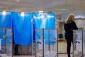 DNIPRO, UKRAINE - March 31, 2019:View of ballots in ballot box at vote station. Election of Ukraine President. Observers from Royalty Free Stock Photo