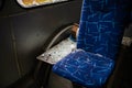 Dnipro, Ukraine Nov 17, 2022: Shards of a broken window on the seat