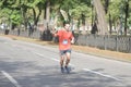 Lonely Happy man running on an empty city street during 21 km distance of Almaz group Dnipro Marathon
