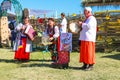 Folk musicians in traditional ukrainian clothing performs during ethno-rock festival Kozak Fest