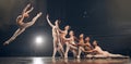 Do it big, do it right, do it with style. a group of ballet dancers practicing a routine on a stage. Royalty Free Stock Photo