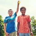 Do it, Im ready. adorable young boys playing with water balloons outdoors. Royalty Free Stock Photo