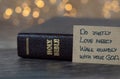 Do justly, love mercy, walk humbly with your God, handwritten biblical quote, Micah 6:8 and holy bible book Royalty Free Stock Photo