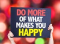 Do More Of What Makes You Happy card with bokeh background Royalty Free Stock Photo