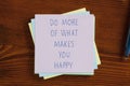 Do more of what makes you happy written on a note