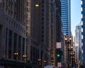 `DO NOT BLOCK INTERSECTION` sign on dark, eerily lit city street in Chicago Loop