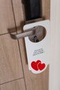 Do not disturb sign at the door of honeymoon suite Royalty Free Stock Photo