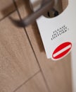 Do not disturb sign at the door of hotel room Royalty Free Stock Photo