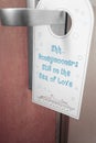 Do not disturb sign hanging on a door Royalty Free Stock Photo