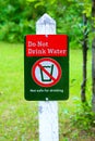 A do not drink water sign with a green background