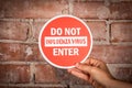 Do Not Enter Influenza Virus Warning Sign On Brick Wall Royalty Free Stock Photo