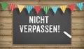Do not miss in German on black board Royalty Free Stock Photo