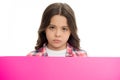 Do not offend children. Girl kid behind pink blank surface copy space. Advertisement concept. Child cute girl looking