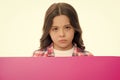 Do not offend children. Girl kid behind pink blank surface copy space. Advertisement concept. Child cute girl looking