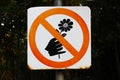 `Do not pick flowers` sign in a park Royalty Free Stock Photo