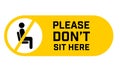 Do Not Sit Here Signage for restaurants and public places inorder to encourage people to practice social distancing to further Royalty Free Stock Photo